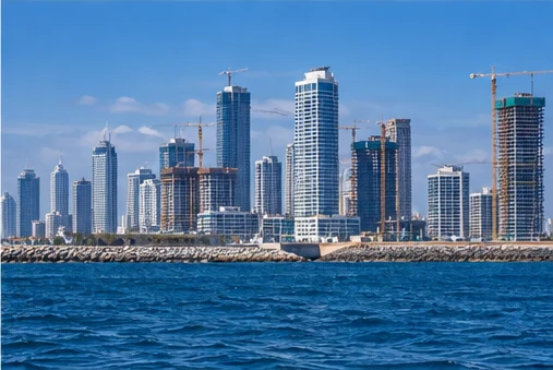 The Colombo skyline from the water, towers and construction cranes